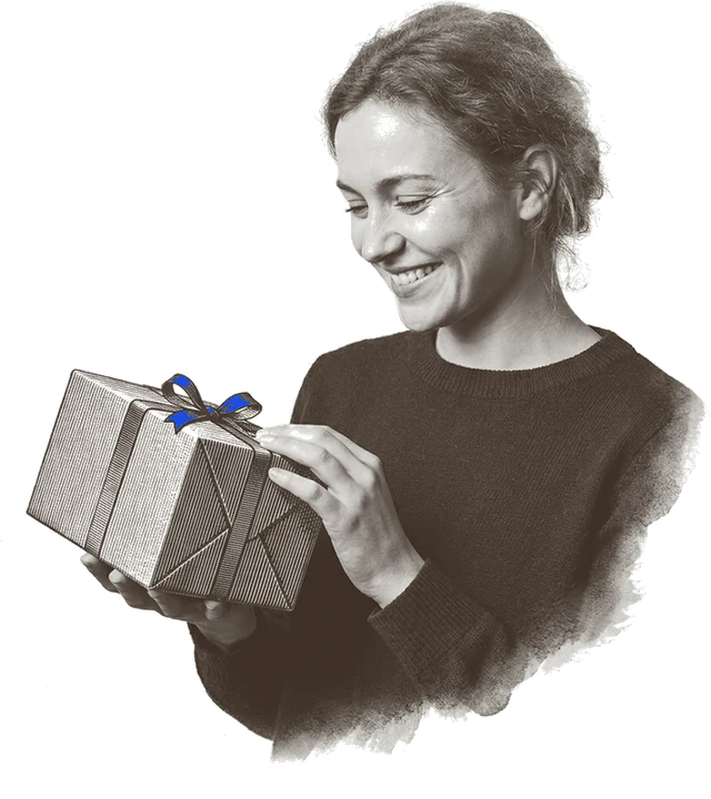 Someone opening a branded product box at a desk