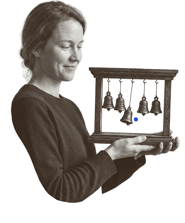 Someone checking a small sensor unit held in one hand