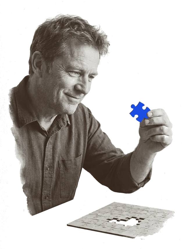 Someone reading a published research report at a desk