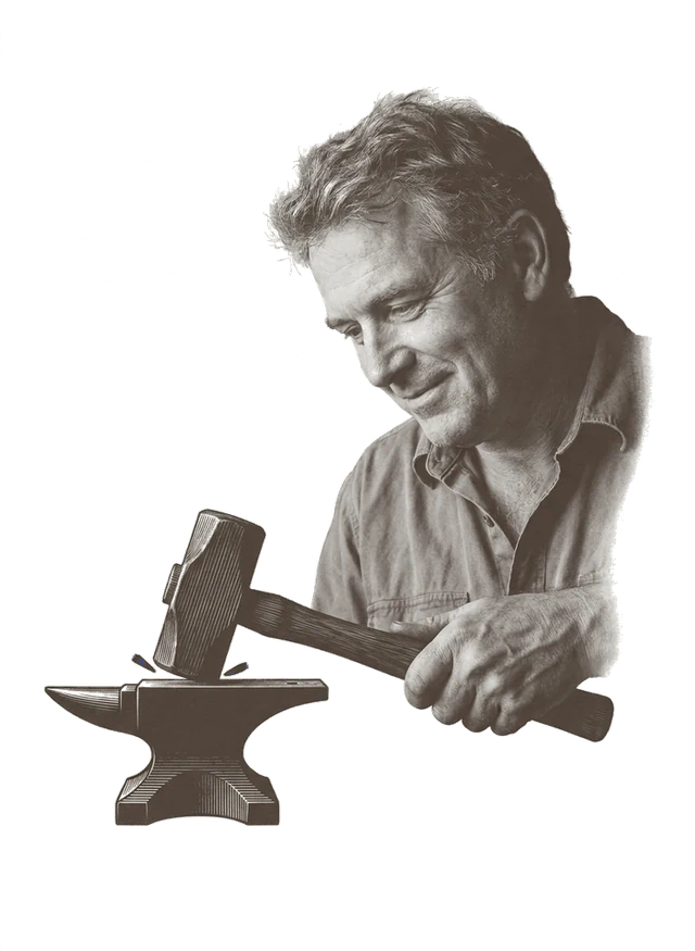 Someone reading a capital project announcement at a workbench